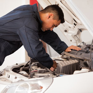 Man Repairing Car
